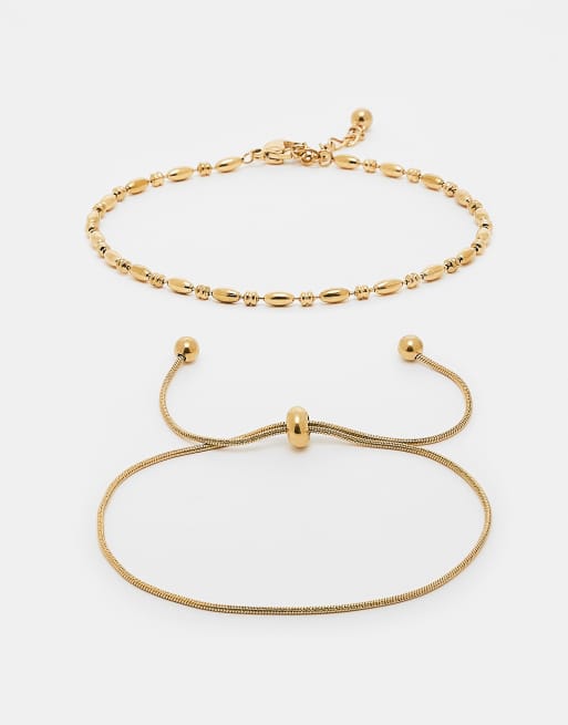 ASOS DESIGN Curve - Set van 2 vriendschapsarmbanden van waterbestendig roestvrij staal met fijne schakels in cadeauverpakking