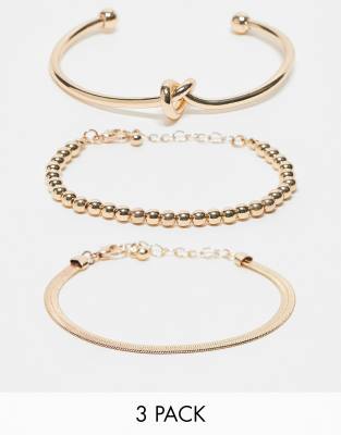 ASOS DESIGN Curve - Set van 3 armbanden met knoop en bolletjes in goudkleur