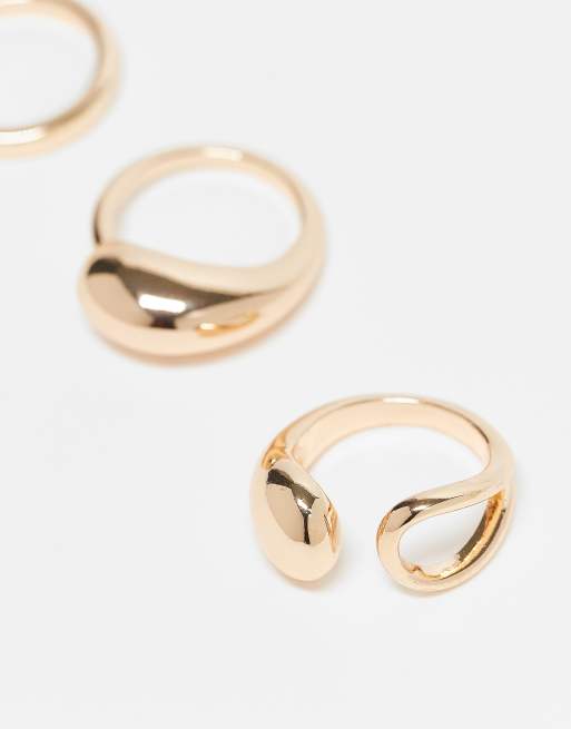 ASOS DESIGN Curve - Set van 3 gewikkelde ringen in goudkleur, 2 van 3