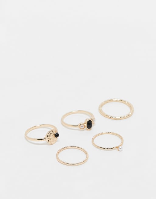 ASOS DESIGN Curve - Set van 5 ringen met zwarte steen en imitatieparels in goudkleur