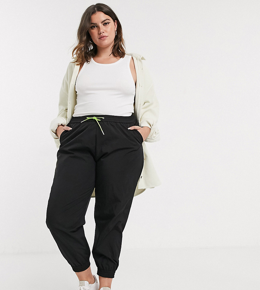 Plus-size sweatpants by ASOS DESIGN Style and comfort – it%27s a lifestyle Drawstring waistband Contrast neon ties Functional side pockets Elasticated cuffs Regular, tapered fit A standard cut around the thigh with a narrow shape through the leg