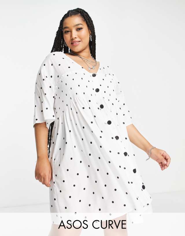 ASOS DESIGN Curve shirred button up mini smock dress in mini polka dot