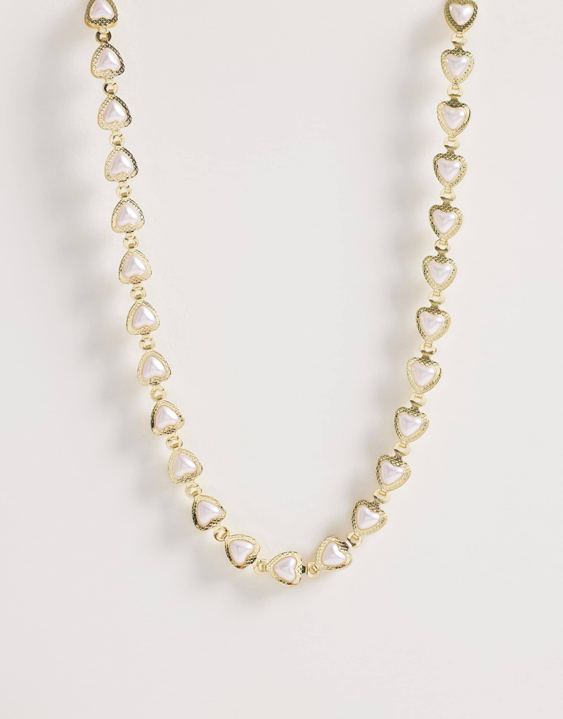 asos design curve short necklace with mini hearts with faux pearls in gold tone