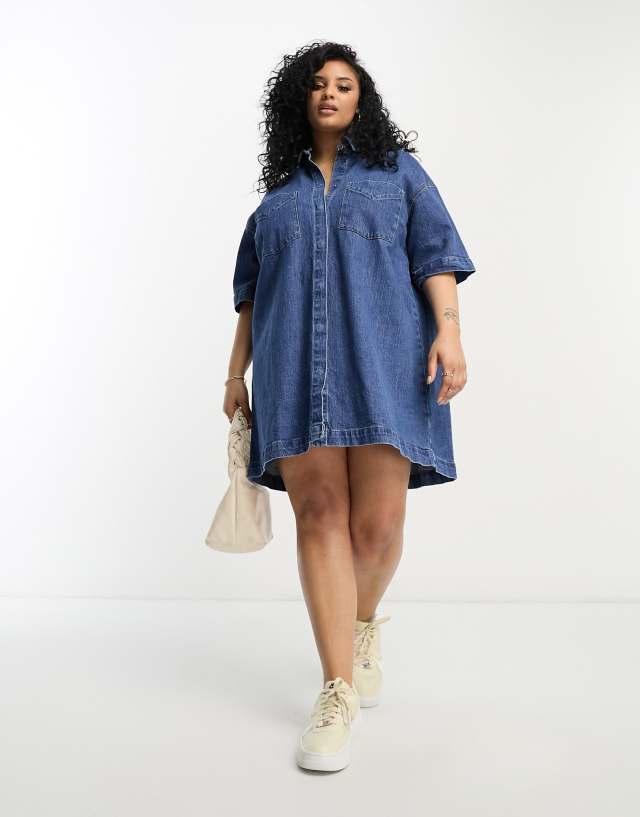 ASOS DESIGN Curve short sleeve denim shirt dress in mid blue