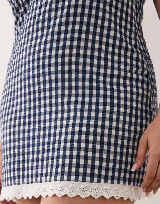 ASOS DESIGN Curve slash neck mini sundress with sculpted bust and broderie hem in navy gingham , 4 of 4
