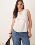 [ASOS Curve] ASOS DESIGN Curve sleeveless lace trim top with ribbon tie detail in white 18 White