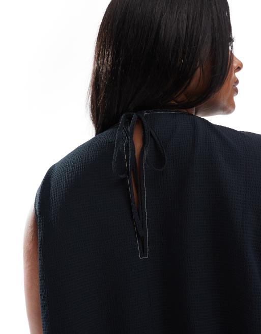 ASOS DESIGN Curve sleeveless peplum top with tie back in black, 4 of 4