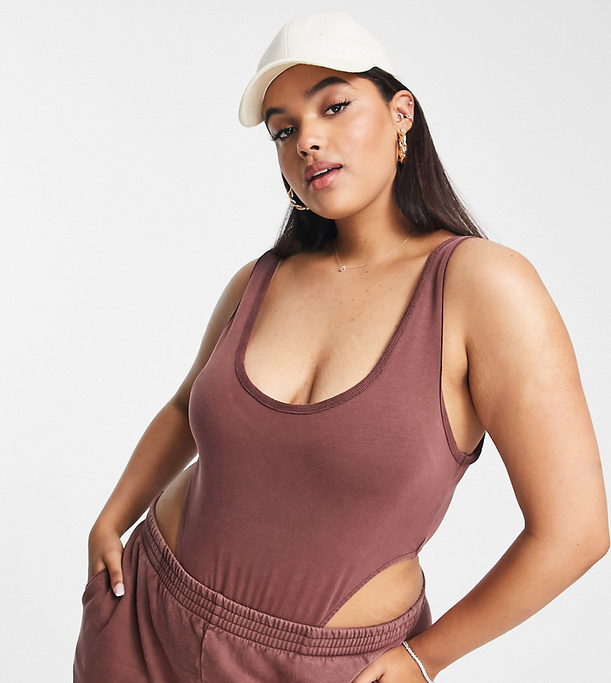 Plus-size bodysuit by ASOS DESIGN Streamline your style Scoop neck Sleeveless design Thong back Bodycon fit