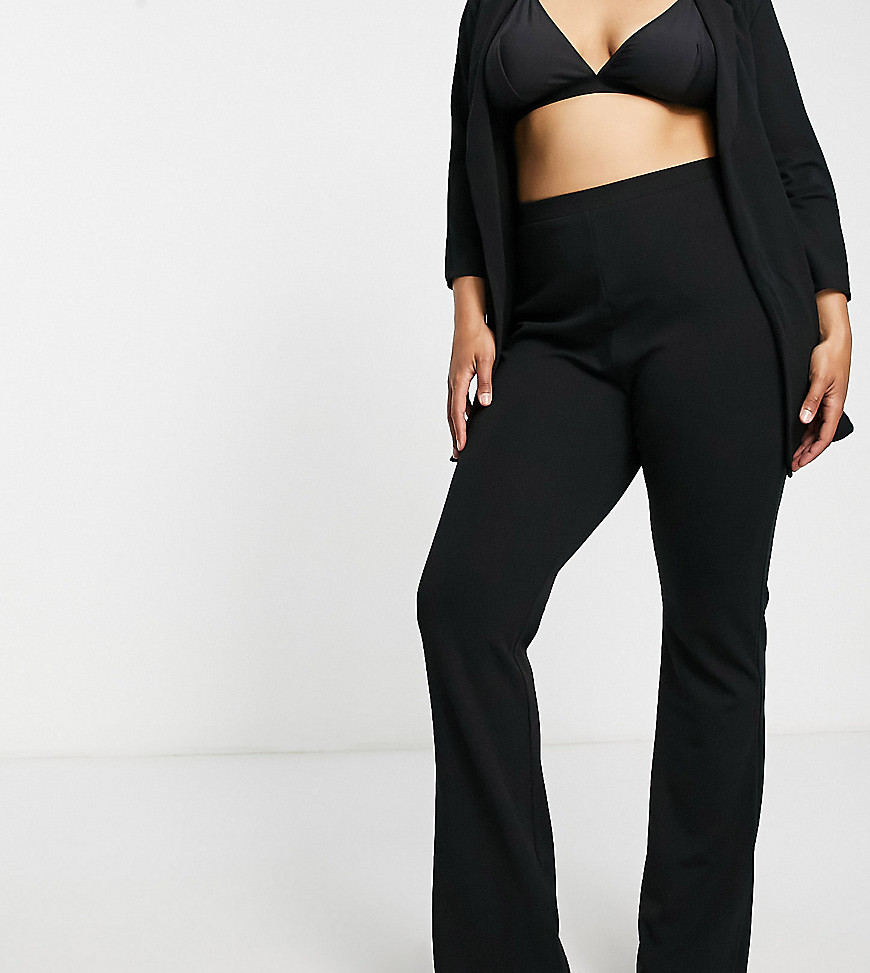 Plus-size trousers by ASOS DESIGN Treat your lower half Plain design High rise Elasticated waist Flared slim fit