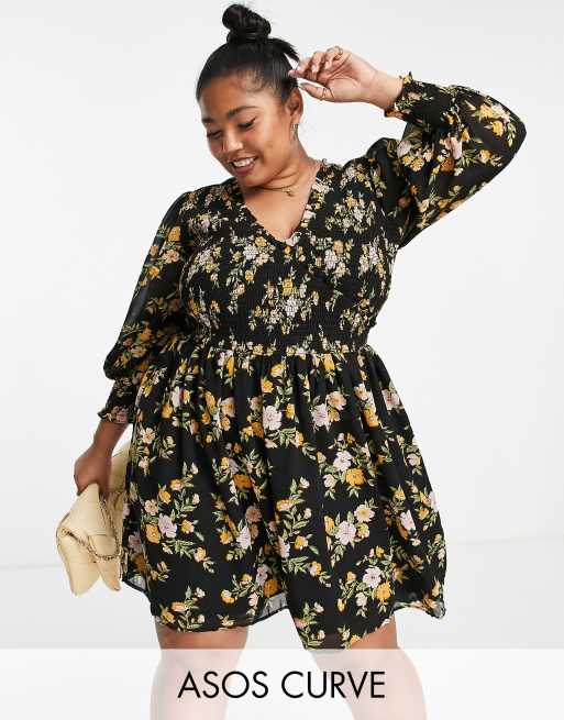 ASOS DESIGN Curve - Smock-minikjole med rynkede ærmekanter i sort og orange blomstermønster