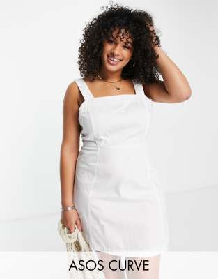 ASOS DESIGN Curve soft denim mini pinny dress in off white