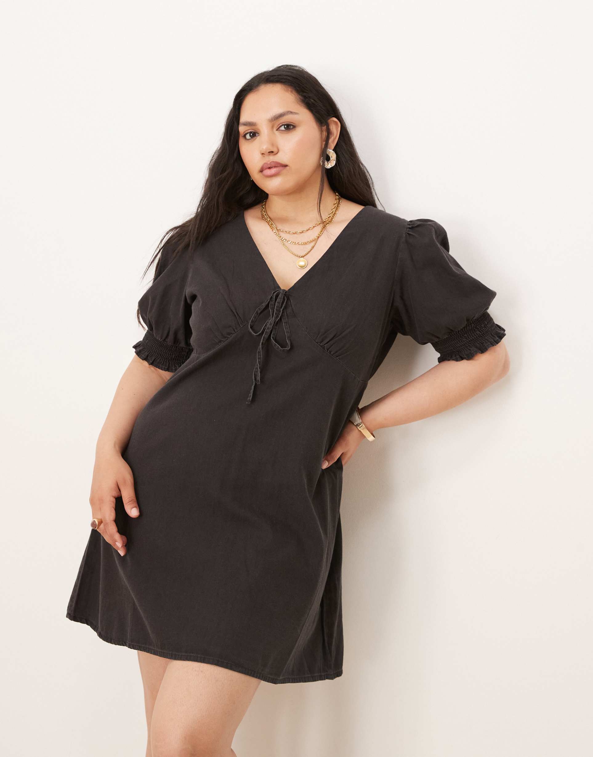 asos design curve soft denim puff sleeve mini dress with frill details in washed black