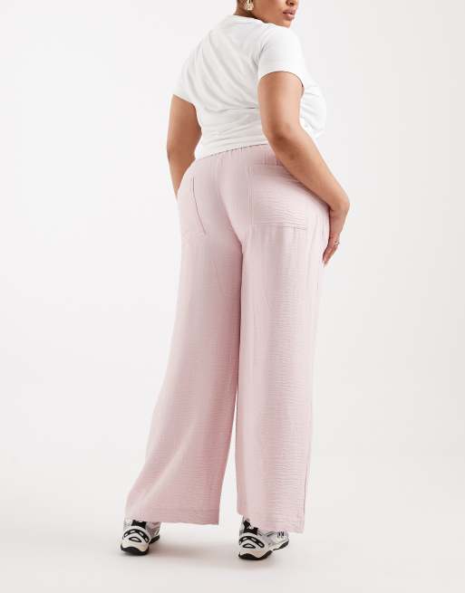 ASOS DESIGN Curve soft texture wide leg trousers in pink, 4 of 5