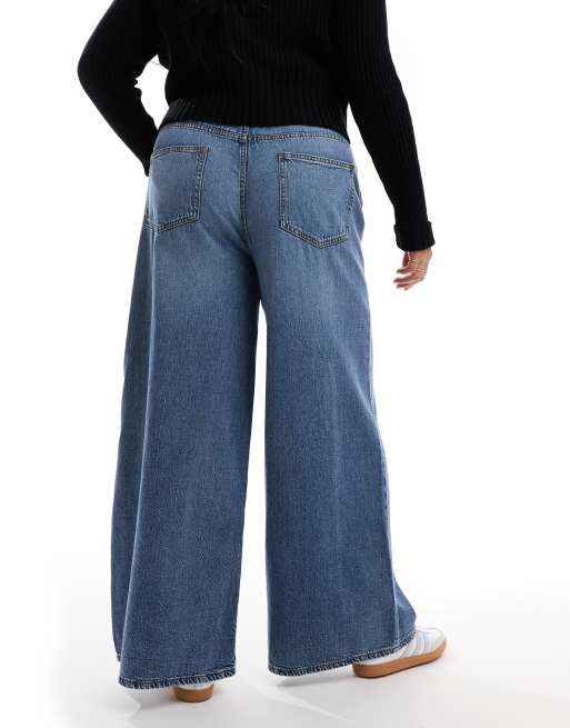 ASOS DESIGN Curve soft wide leg jeans in mid blue | ASOS