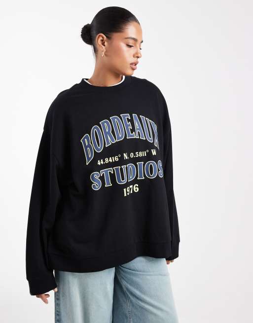 ASOS DESIGN Curve - Sort oversized sweatshirt med 'Bordeaux Studios'-print