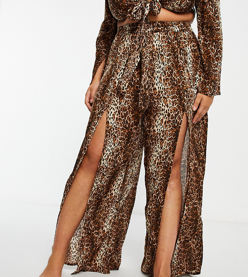 Plus-size trousers by ASOS DESIGN Part of a co-ord set Top sold separately Leopard print High rise Elasticated waist Front splits Relaxed fit Loose cut