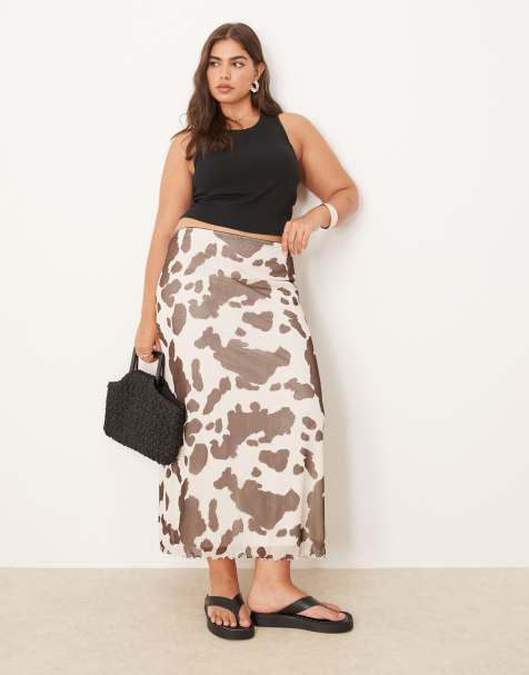 ASOS DESIGN Curve mesh midi skirt in cow print
