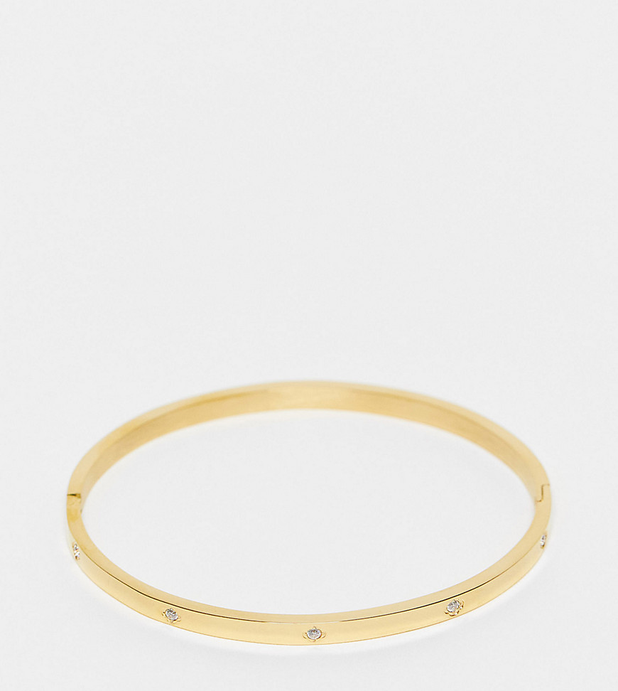 ASOS DESIGN Curve stainless steel bangle with crystal design in gold tone