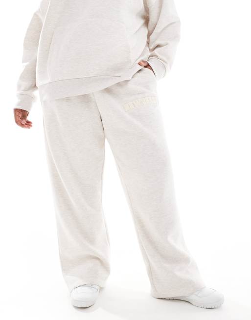 ASOS DESIGN Curve straight leg sweatpants with chenille New Jersey graphic in heathered oatmeal - part of a set