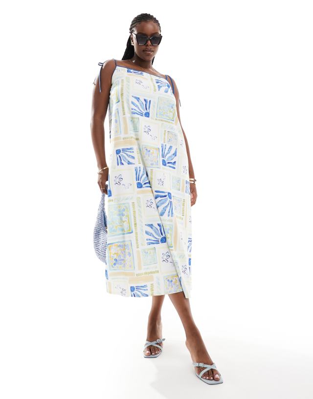 ASOS Curve - ASOS DESIGN Curve strappy trapeze maxi dress with contrast straps in summer tile print