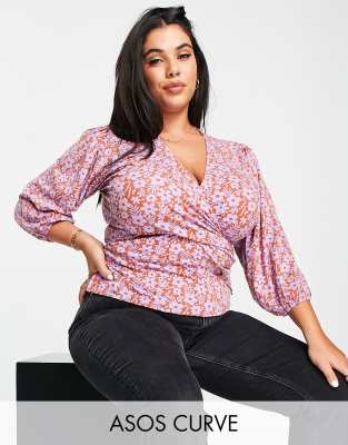 ASOS DESIGN Curve stretch wrap blouse with puff sleeves in retro floral print