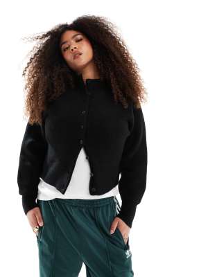 ASOS DESIGN Curve - Strickjacke in Schwarz mit kompakter Struktur und Rundhalsausschnitt