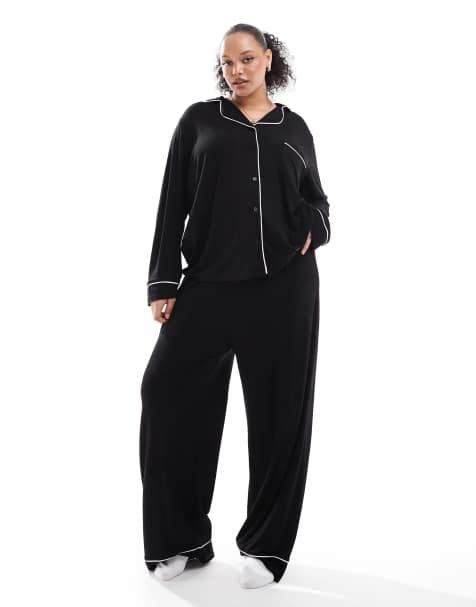 ASOS DESIGN Curve super soft long sleeve shirt & trouser pyjama set with contrast piping in black - view 1
