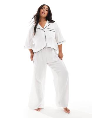 ASOS DESIGN Curve super soft slinky wide leg pajama pants in white with contrast binding