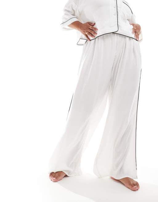 ASOS DESIGN Curve super soft slinky wide leg pajama pants in white with contrast binding