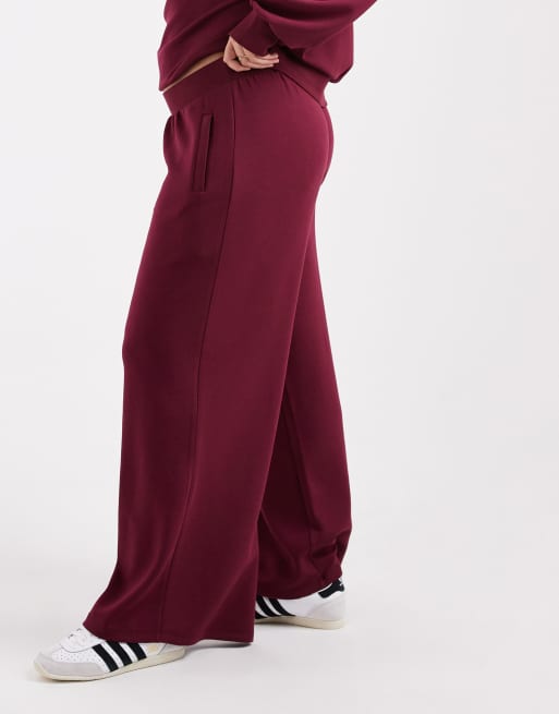 ASOS DESIGN Curve super wide leg sweatpants in burgundy