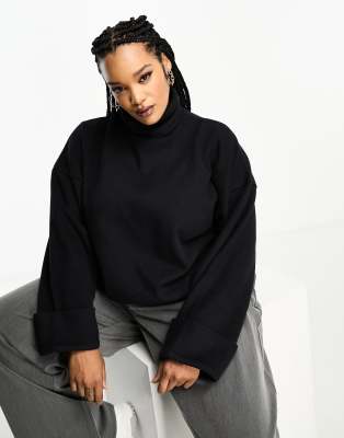 ASOS DESIGN Curve - Superweicher Rollkragenpullover in Schwarz mit Bündchendetail