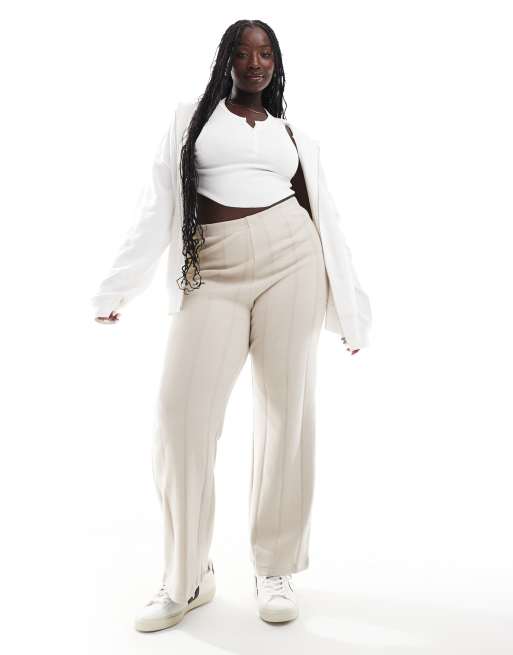 ASOS DESIGN Curve - Superzachte geribbelde joggingbroek met wijde pijpen in warm crème