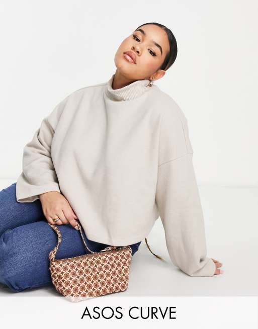 ASOS DESIGN Curve - Superzachte hoogsluitende trui in warme gemêleerd crème