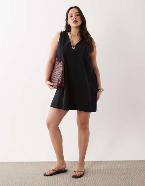 ASOS DESIGN Curve – Svart, smockad miniklänning i bomulls- och linnemix med v-ringning - view 1