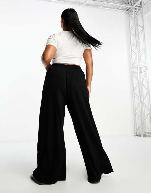 ASOS DESIGN Curve – Svarta vida byxor med knytskärp, 3 av 4