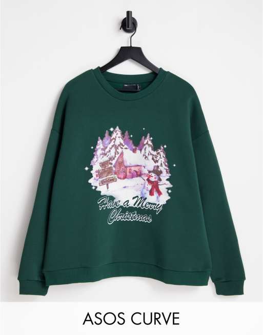 ASOS DESIGN Curve - Sweat de Noël oversize avec imprimé paysage rétro - Vert forêt