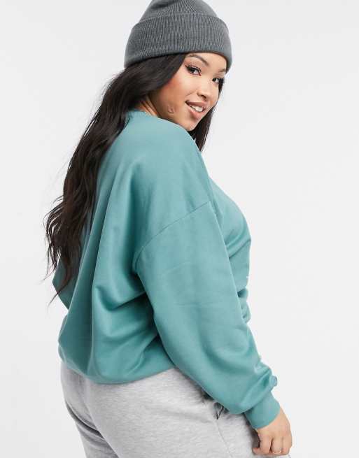ASOS Design Curve - Sweatshirt met vintage Montana-print in groen met wassing, 2 van 4