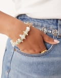 [ASOS Curve] ASOS DESIGN Curve t-bar bracelet with faux chipping details in gold tone No Size GOLD