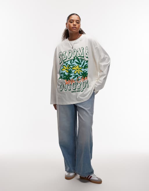 ASOS DESIGN Curve - T-shirt skater a maniche lunghe oversize color crema con grafica Flower Bloom