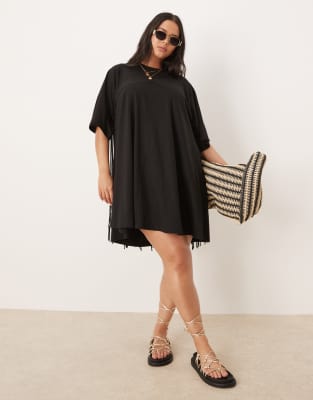 ASOS DESIGN Curve t shirt swing mini dress with fringe back detail in black