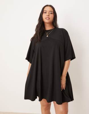 ASOS DESIGN Curve t shirt swing mini dress with fringe back detail in black