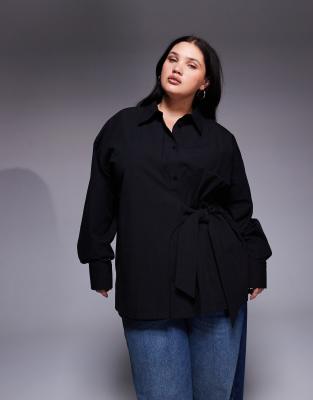ASOS DESIGN Curve - Taillierte Oversize-Hemdbluse in Schwarz mit gewickeltem Schleifendetail