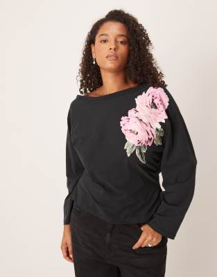 ASOS DESIGN Curve - Tailliertes Oberteil in Schwarz mit U-Boot-Ausschnitt und Blumengrafik