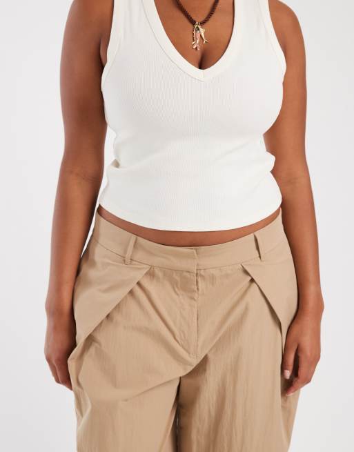 ASOS DESIGN Curve Tailored pleat front detail wide leg pants in sponge green, 3 of 5