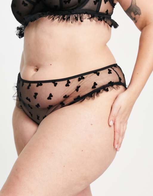 ASOS DESIGN Curve - Tallulah - Culotte brésilienne en tulle avec motif nœuds floqué - Noir
