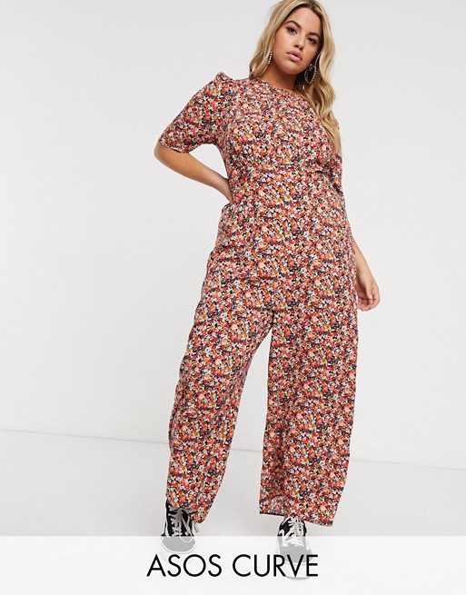 ASOS DESIGN curve tea jumpsuit with self button detail in mixed floral print