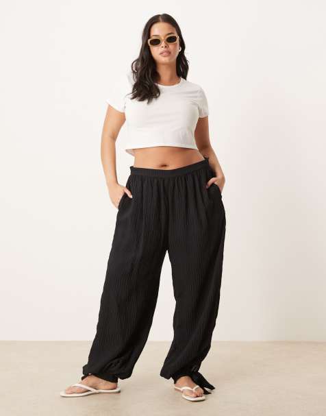 ASOS DESIGN Curve textured stripe billow trousers with cuff detail in black