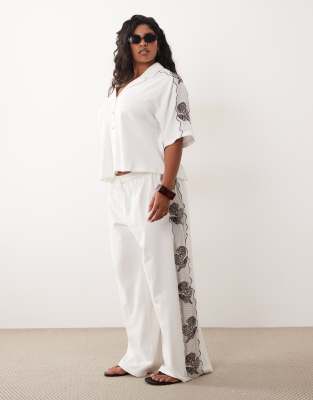 ASOS DESIGN Curve textured jersey wide leg trouser co-ord with shell embroidery in cream
