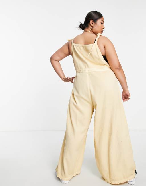 ASOS DESIGN Curve textured tie shoulder dungaree in washed stone ASOS