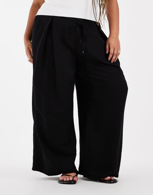 ASOS DESIGN Curve textured wide leg trousers with tie waist in black, 2 of 5